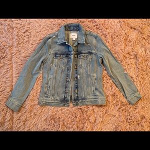 old navy denim jean jacket with small rips.